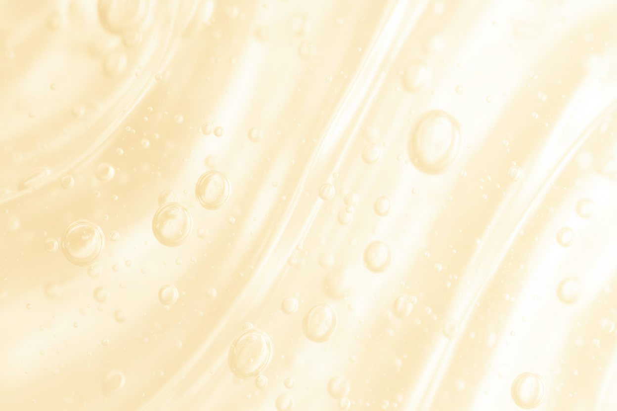 Close-up of amber liquid with bubbles