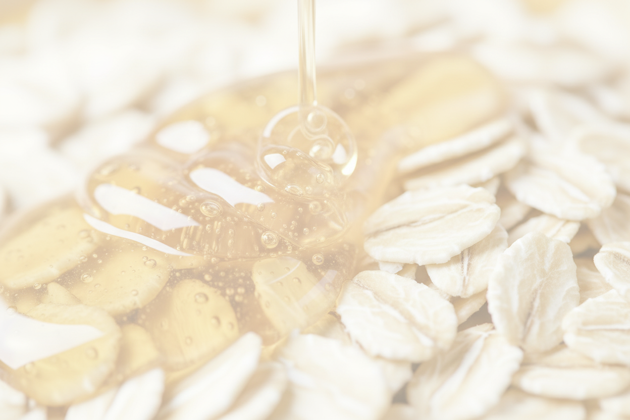 Honey being drizzled onto oats with a close-up view of the honey and oats.
